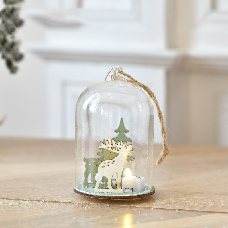 Boule de Noël sous cloche en verre – Père Noël ou renne